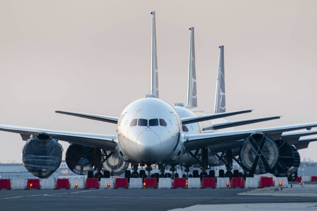 Warsaw, Poland -17/03/2020: Airlines Coronavirus, LOT Polish Airlines Boeing 787's grounded at Warsaw chopin Airport due to the global pandemic
